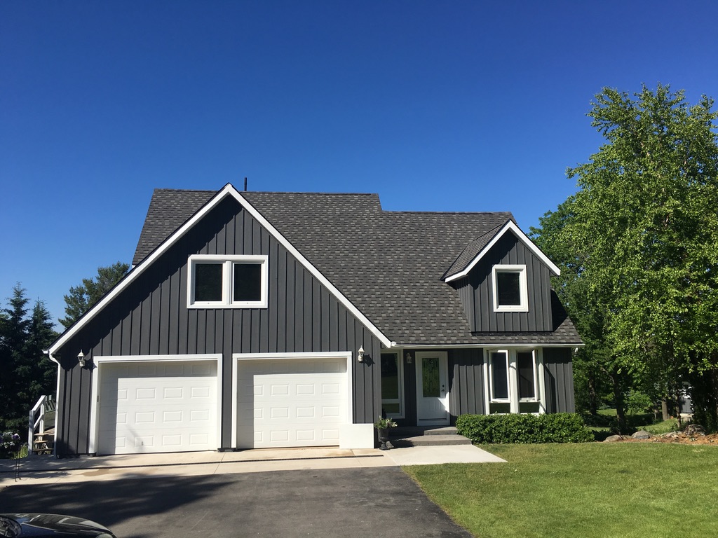 Full exterior painting transformation in grey